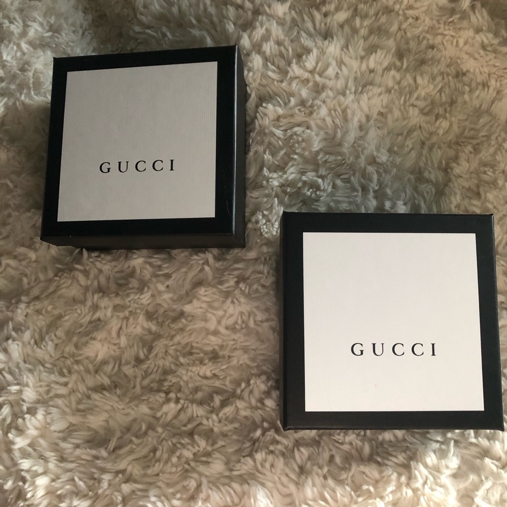 Two Gucci boxes
